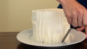 add texture to frosting with offset spatula how to travel with a cake in your suitcase