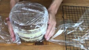 wrap cake in two layers of cling film saran wrap how to travel with a cake in your suitcase