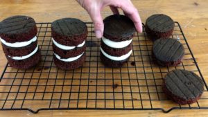 assemble mini cake with cookie cutter cake layers for how to make mini cakes