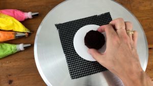 attach first layer to cake board for how to make mini cakes