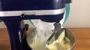 add powdered sugar to butter to make buttercream