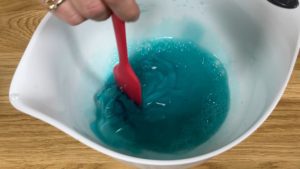 tint enough jelly to cover your cake with stained glass jelly cake tutorial