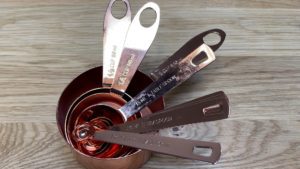 copper measuring cups and spoons 25 Gift Ideas for Bakers