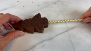 push paper straw into brownie to make a cake topper 6 sprinkle christmas cake decorating ideas