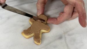 smooth buttercream with palette knife or offset spatula EASY Christmas Cookies