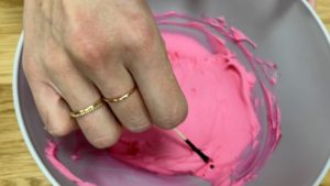 apply small amounts of gel colour with toothpick to buttercream