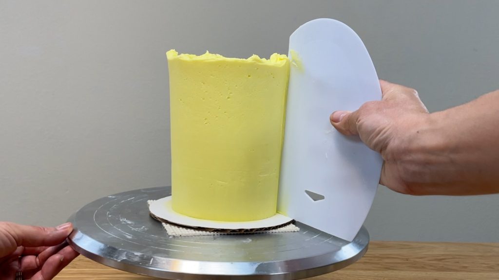 can use any material of frosting smoother How to Make a Birthday Cake