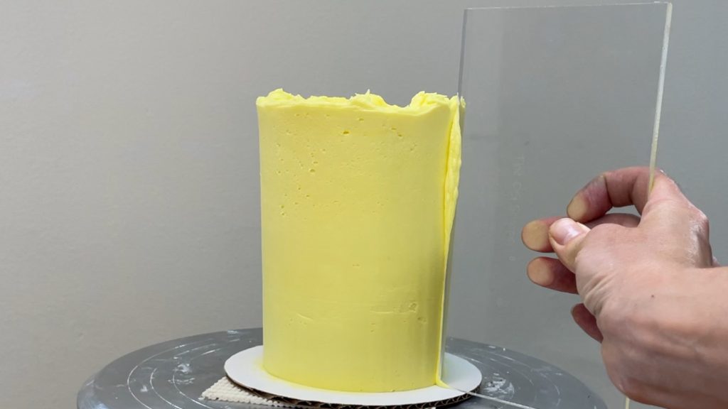 smooth frosting with acrylic frosting smoother How to Make a Birthday Cake