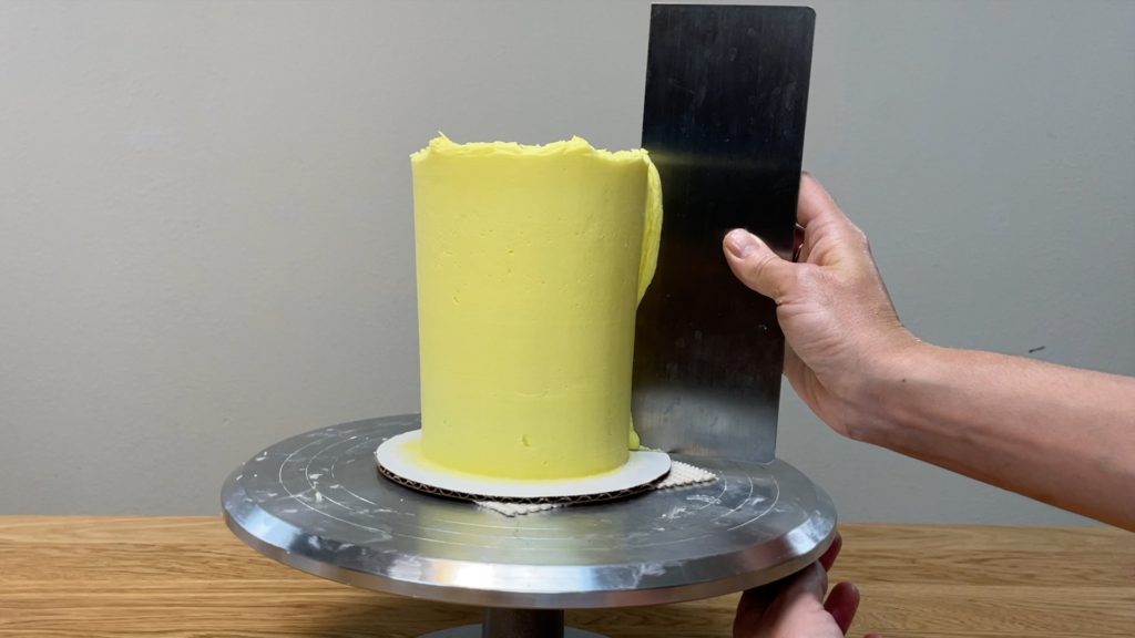 smooth frosting with metal frosting smoother How to Make a Birthday Cake