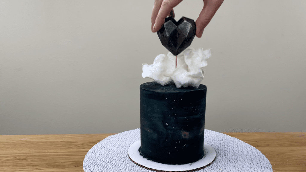 push geometric heart cake topper into cake How to Make a Galaxy Cake