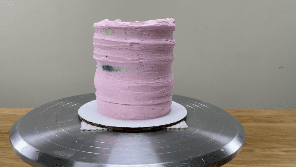 cake showing through frosting after using cake comb 10 Cake Fails and How to Fix Them