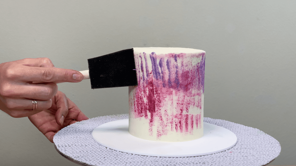 create different textures by holding the sponge at different angles How to Paint on Cakes