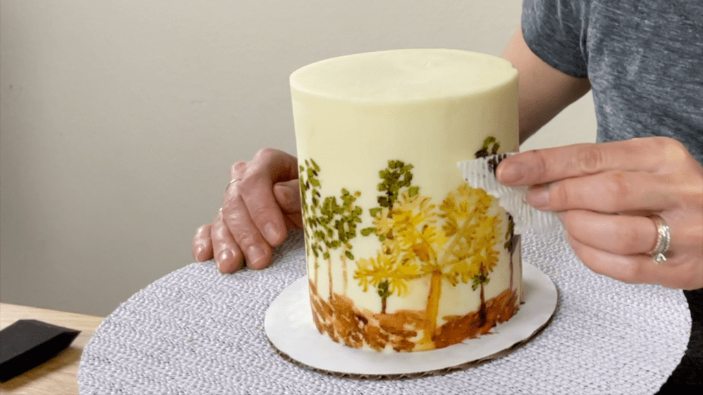 dab cake to take off excess paint How to Paint on Cakes