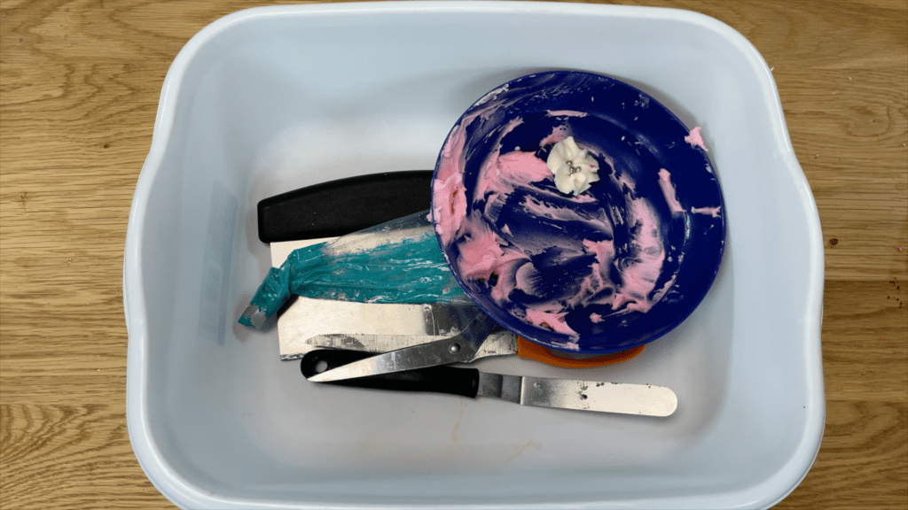 tray or bucket for dirty cake decorating tools 6 cake hacks to save time