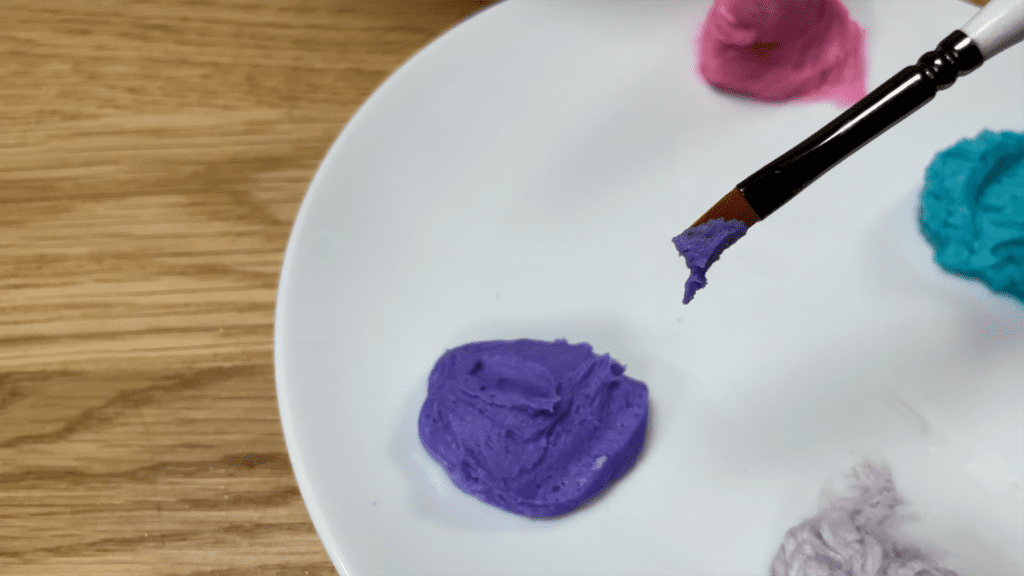 you only need a small amount of buttercream How to Paint on Cakes