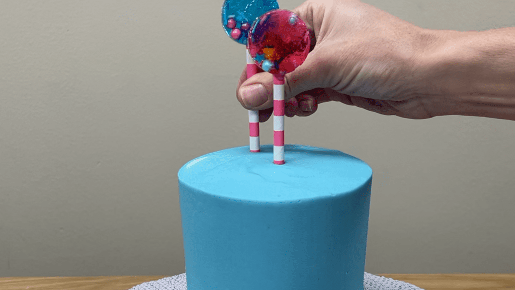 push homemade lollipops into cake 5 Cake Hacks to WOW!