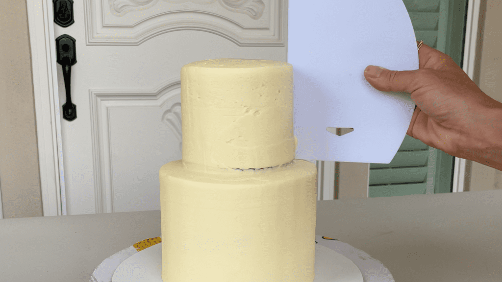 smooth frosting around join of tier cake How To Transport A Cake 2000 Miles