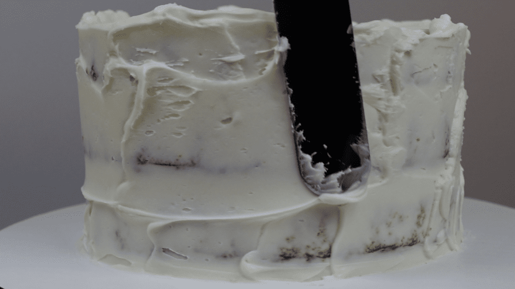 crumb coat prevents crumbs in final coat of frosting Which Cake Scraper Is Best?