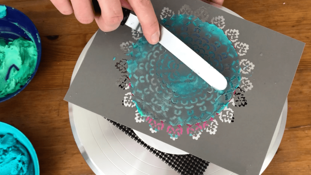 offset spatula to spread frosting onto stencil 10 Must Have Cake Decorating Tools