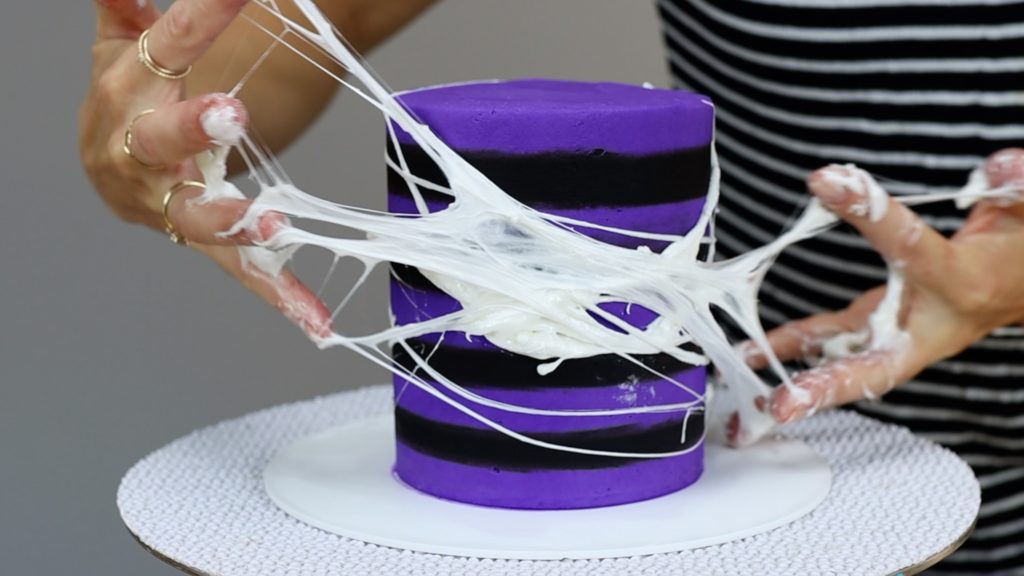 marshmallow spiderwebs 10 Halloween Cake Hacks