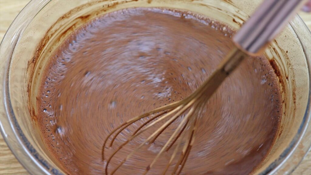 whisk cocoa powder and hot water Perfect Chocolate Cake Recipe British Girl Bakes