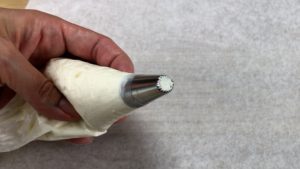 199 piping tip for gold buttercream pumpkins on Striped Halloween Cake