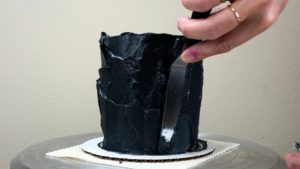 black buttercream that won't stain your teeth frosting for striped halloween cake with gold buttercream pumpkins