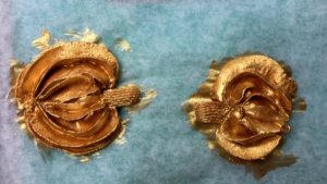 gold buttercream pumpkins for striped halloween cake