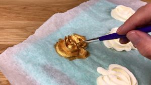 painting gold pumpkins with gold luster dust and vodka