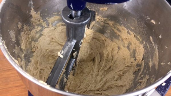 wet ingredients in mixer for chocolate chip cookie cake