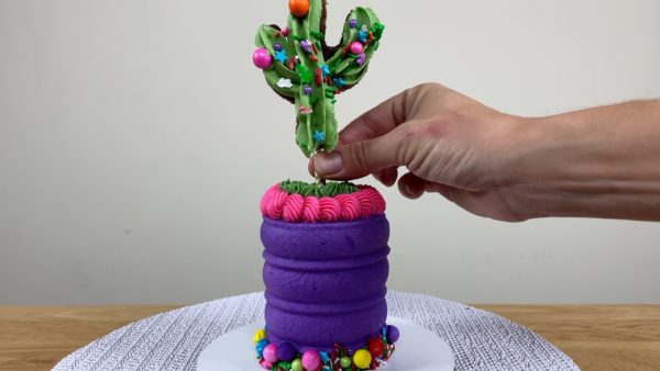 push straw into cake for brownie cake toppers