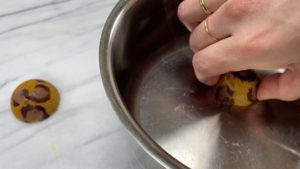 attach leopard print chocolate halves to make balls for trendy neon leopard print cake