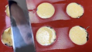 flatten spherical chocolates with offset spatula