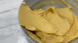 yellow buttercream for leopard print frosting for trendy neon leopard print cake