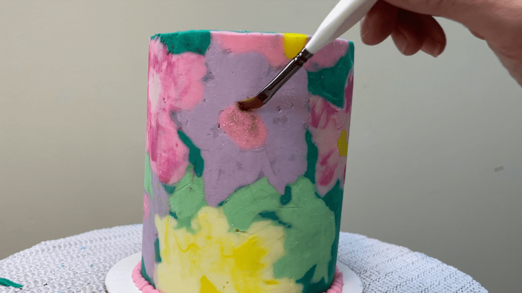 dab edible glitter with paintbrush how to transfer any design onto a cake
