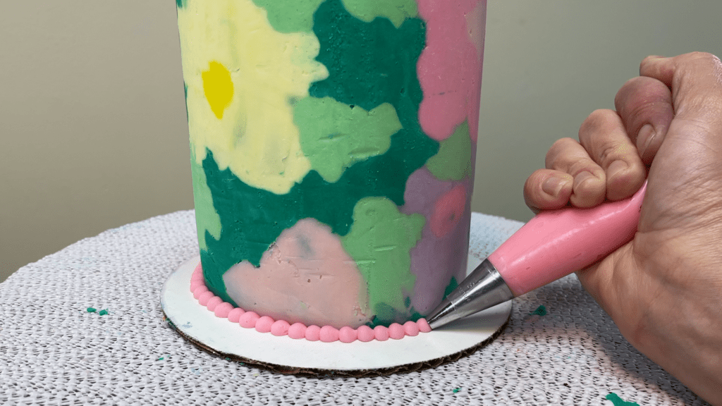 pipe a buttercream border around the bottom of the cake how to transfer any design onto a cake