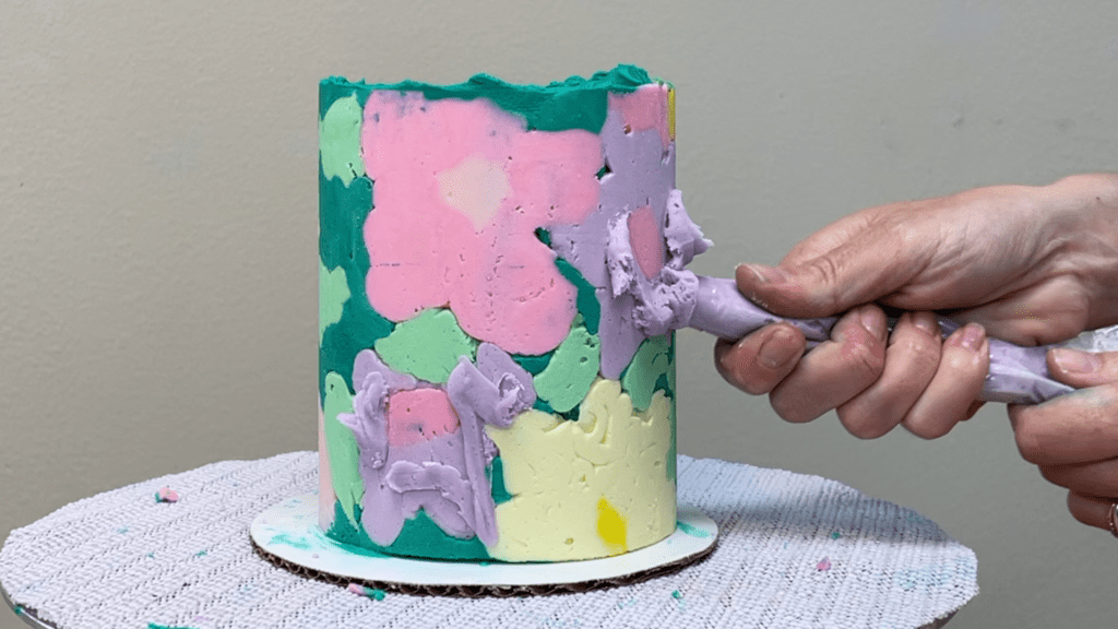 pipe and spread buttercream to fill air pockets how to transfer any design onto a cake