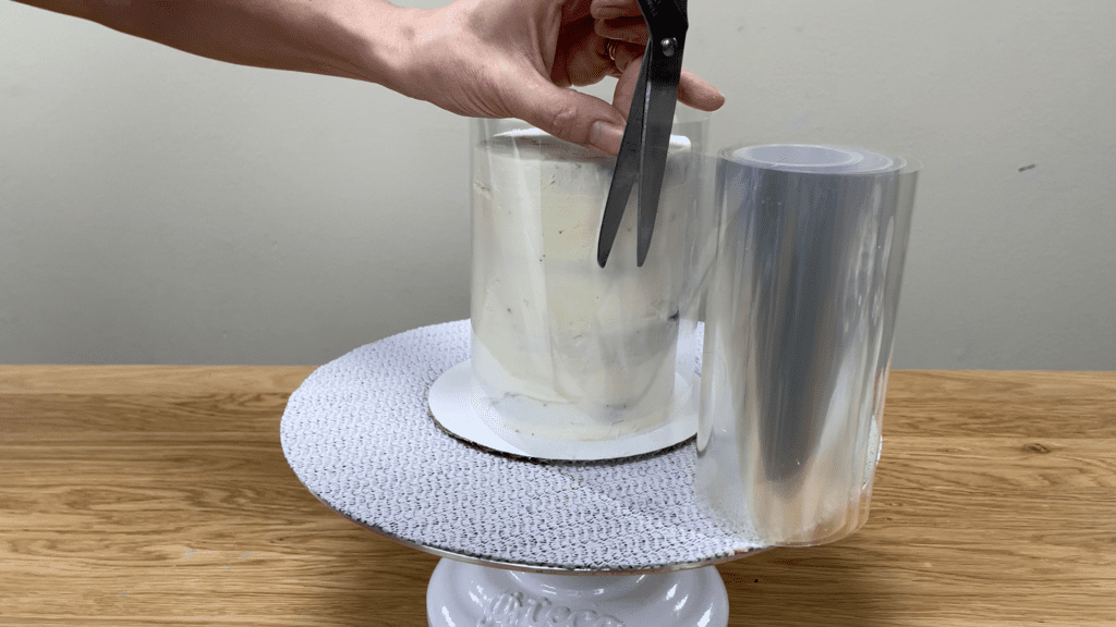 wrap acetate around cake and trim how to transfer any design onto a cake