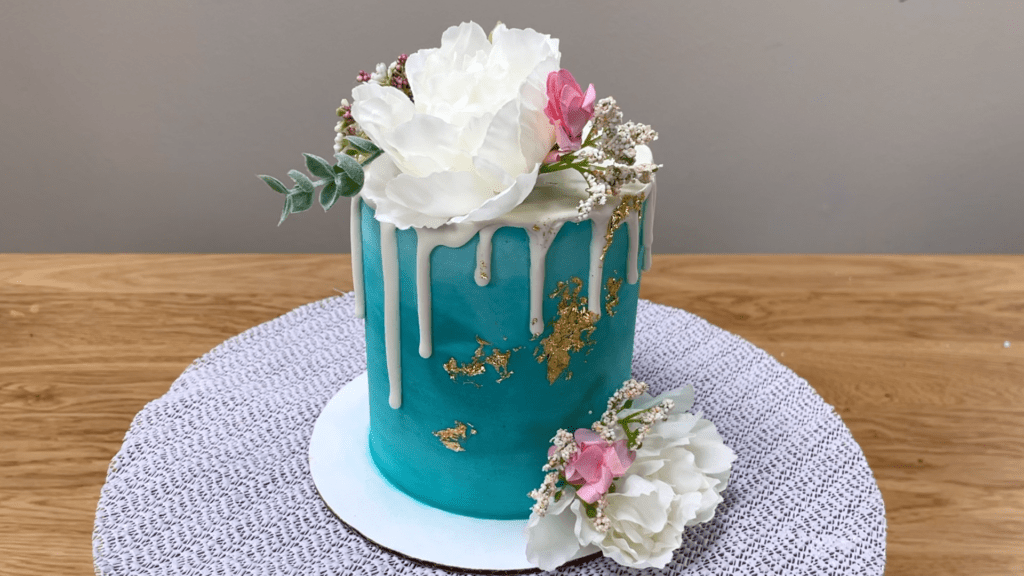 arrange gold leaf randomly on cake How To Use Gold Leaf On Cakes