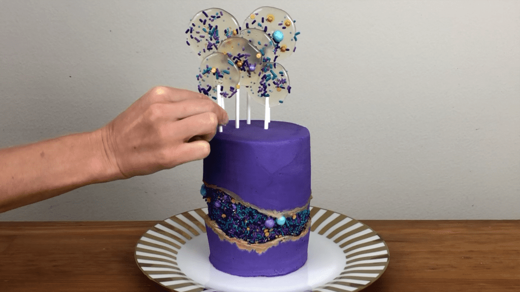 push lollipops into cake homemade sugar lollipops recipe