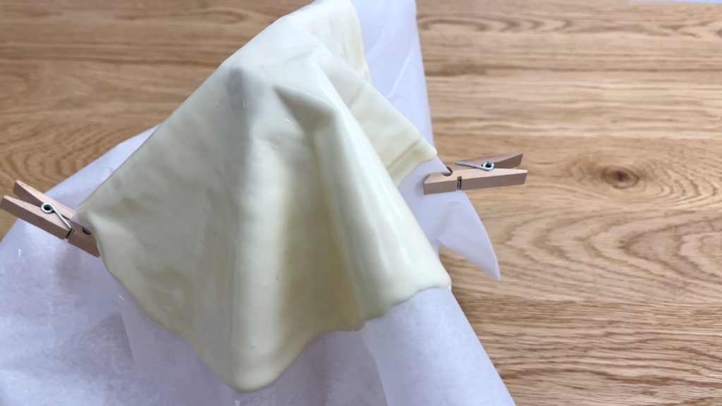 drape parchment over bottle to set chocolate sail or basket 4 Stunning Homemade Cake Toppers