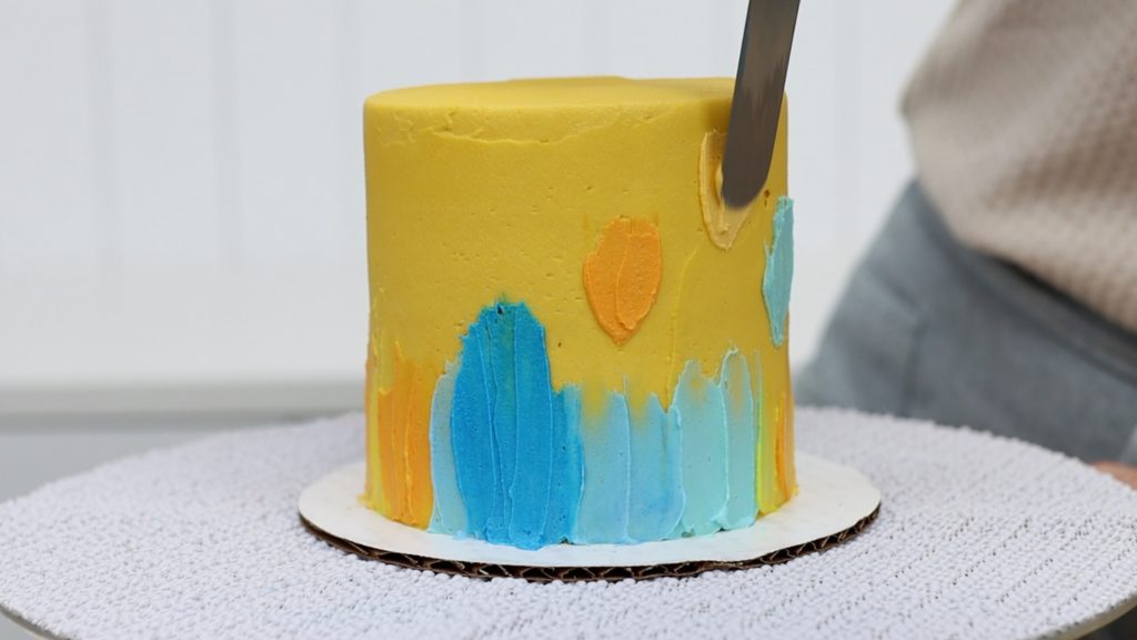 paint onto a cake using buttercream 5 Minute Cake Decorating Spatula Painting