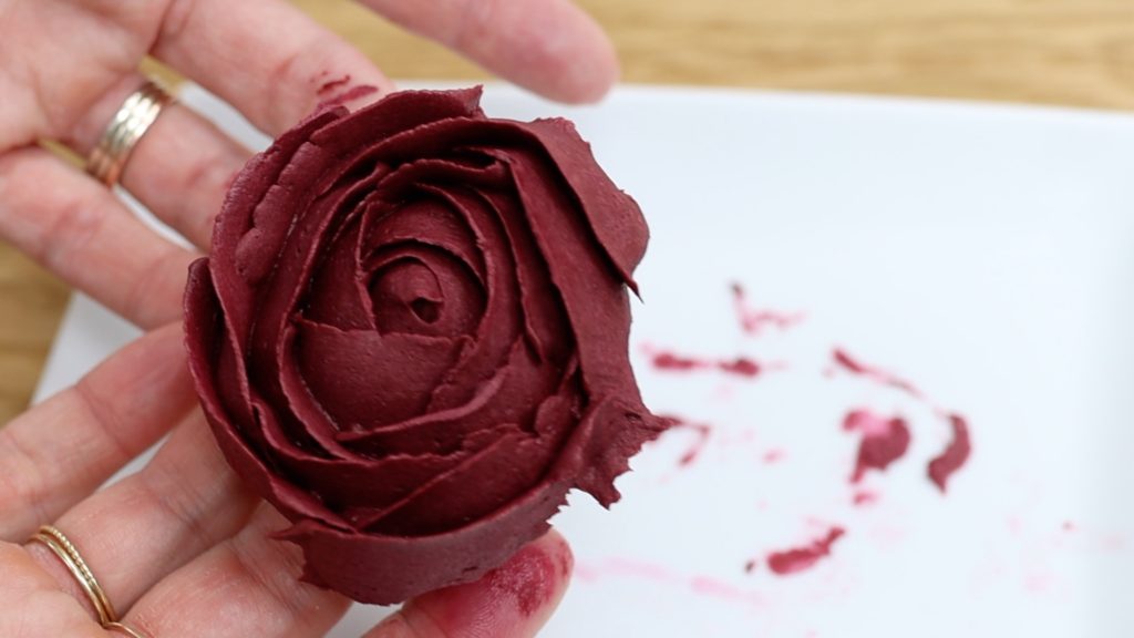 peel rose off parchment and place on cake 4 Stunning Homemade Cake Toppers