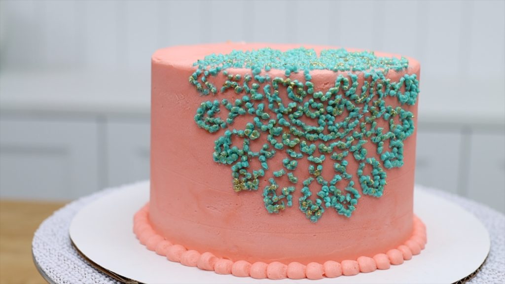 stencil pointillist design with gold on cake 10 ways to make your cakes look professional