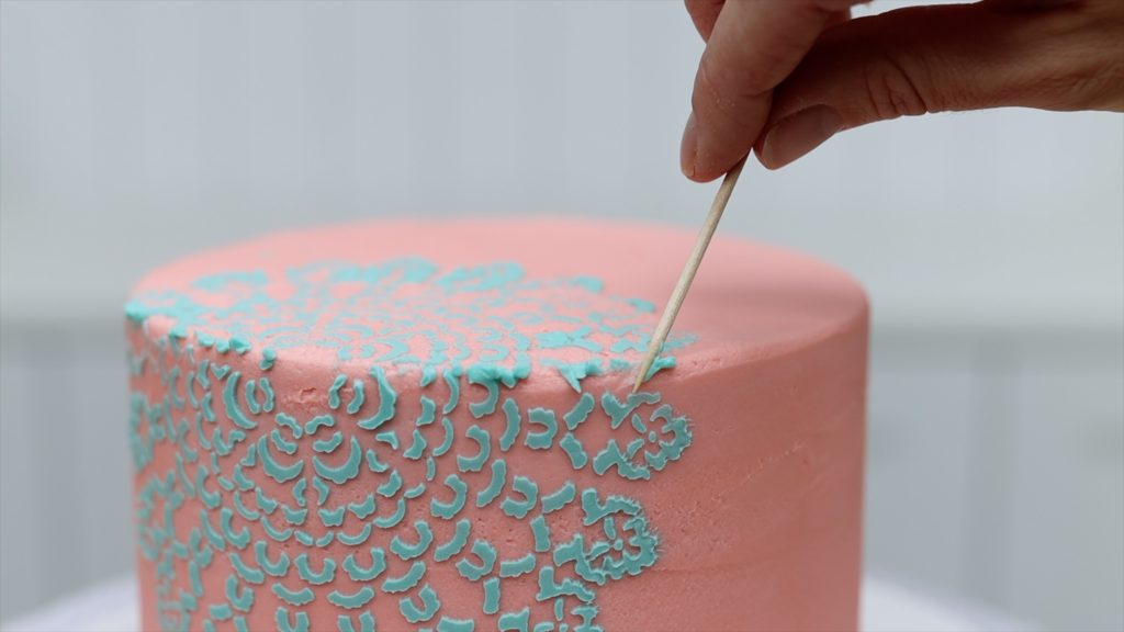 tidy up a stencil design with a toothpick 10 ways to make your cakes look professional