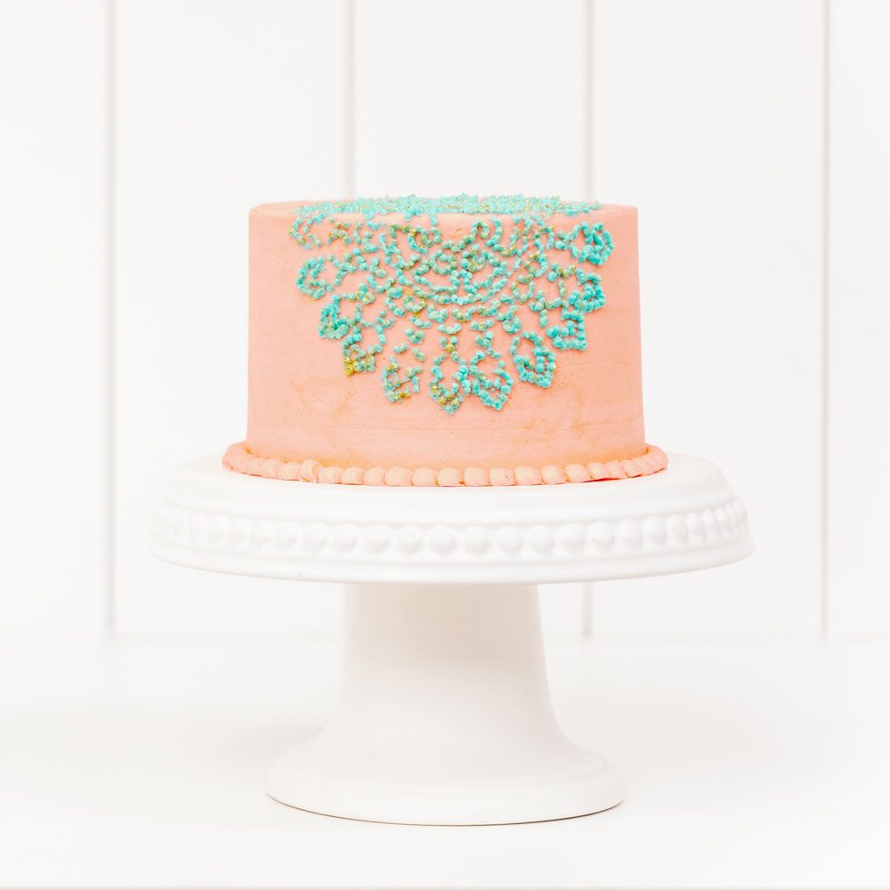 Stenciled buttercream cake decorating with gold accents | British Girl Bakes