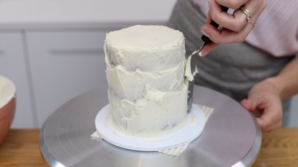 apply a crumb coat and a final coat of frosting to your cakes 15 Frosting Mistakes You're Making