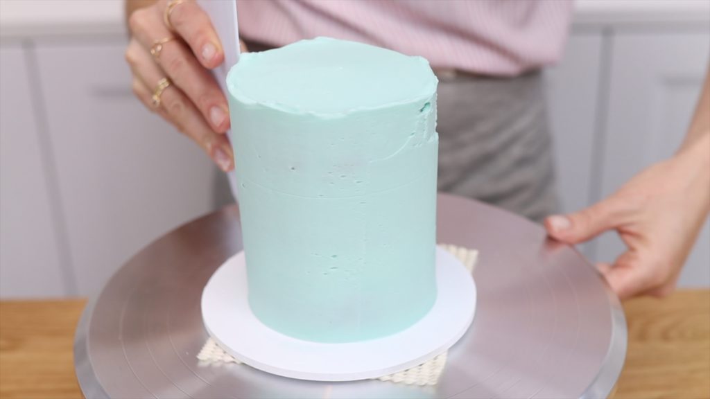 dont apply the frosting too thinly or you'll see the cake layers through the frosting 15 Frosting Mistakes You're Making