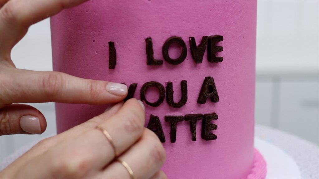 how to attach chocolate letters to a cake to write a message