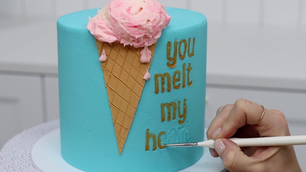 how to paint onto letters imprinted with sweet stamp letters onto a cake